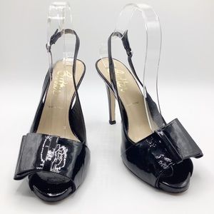 Butter patent leather sling back pumps